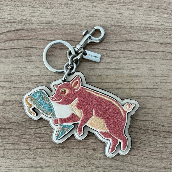 Coach Handbags - Coach glittery Party Pig bag charms FOBs keychain